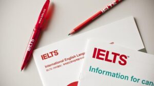 ielts logo, ielts pen and booklet